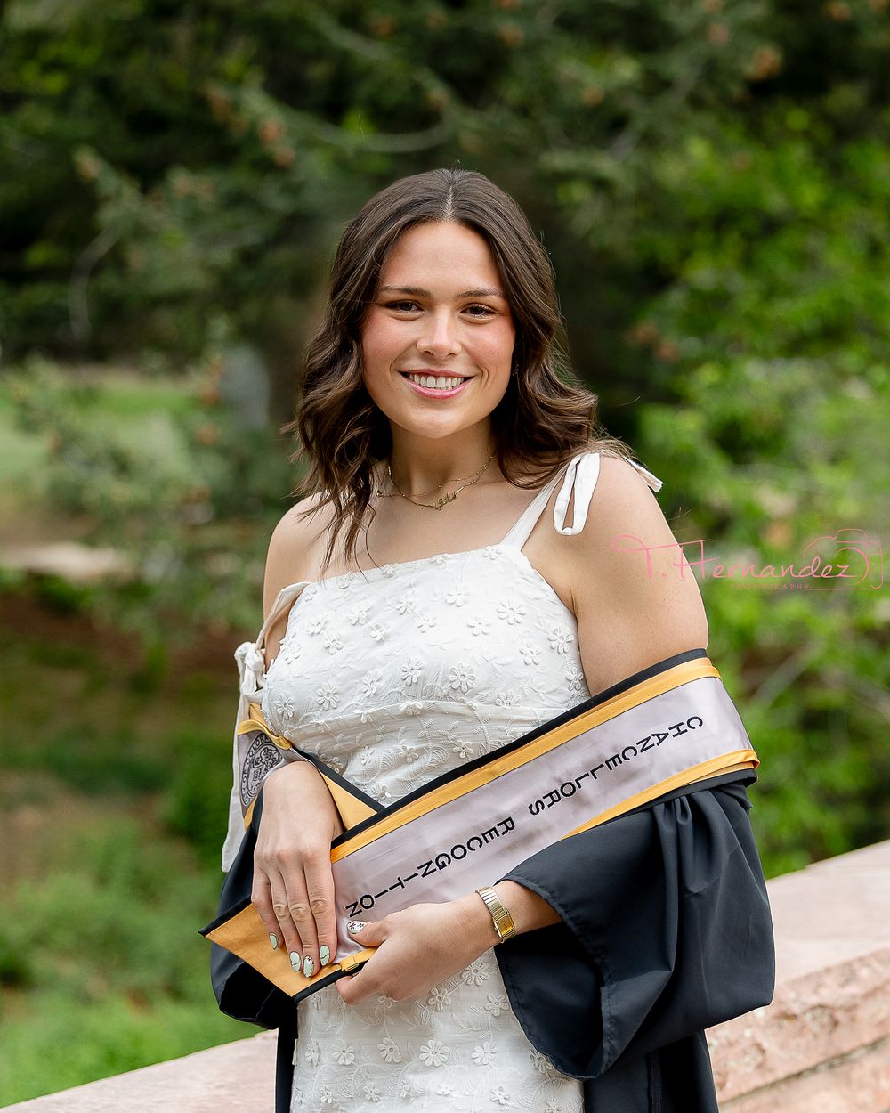 CU Boulder & South Carolina graduation photographer specializing in senior portraits, cap-and-gown photos, and college grad sessions.
