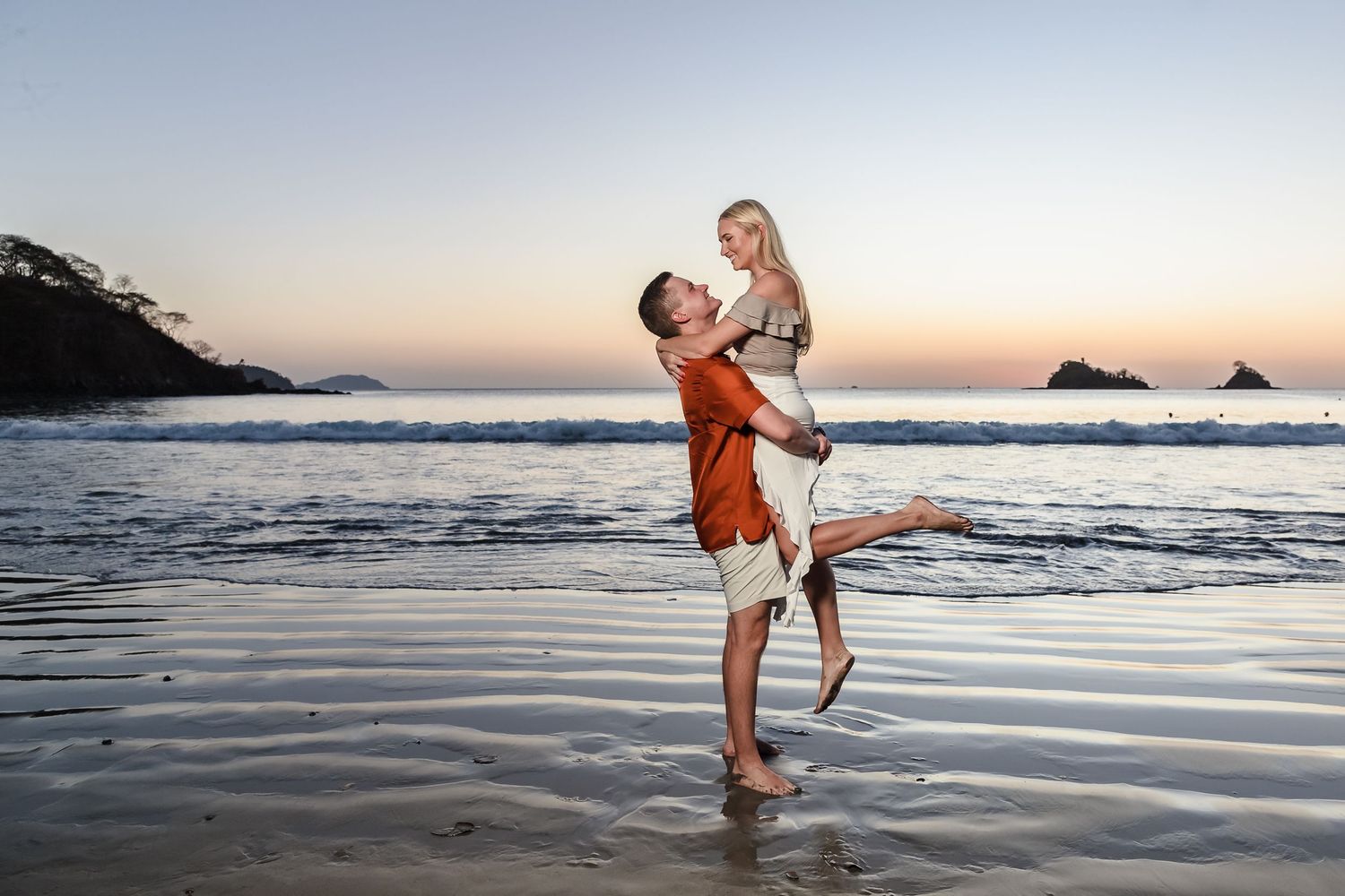 destination engagement photography on the beach at sunset