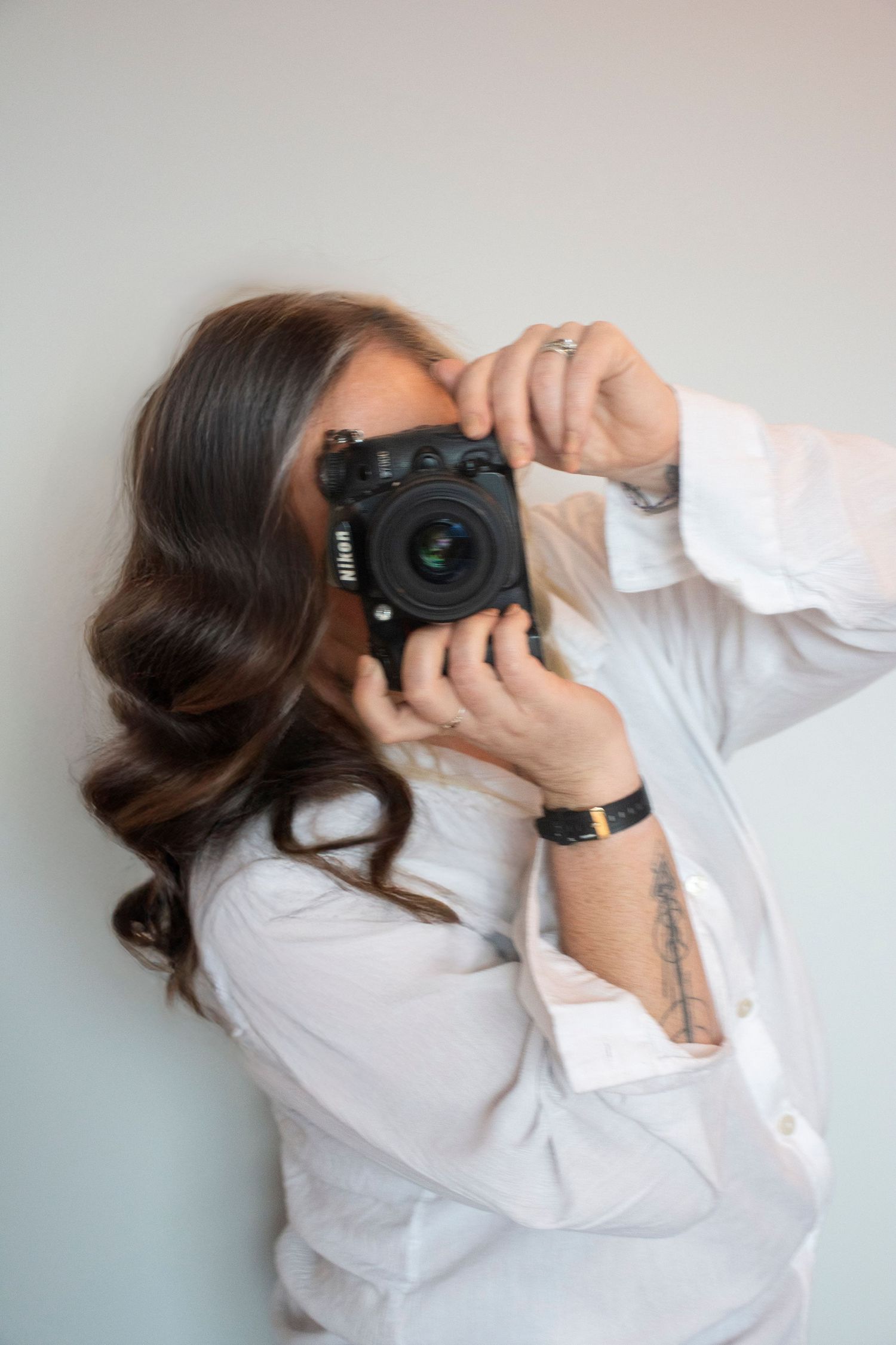 Stay&cee Creative photographer, capturing moments with a professional camera to elevate your brand’s visual storytelling