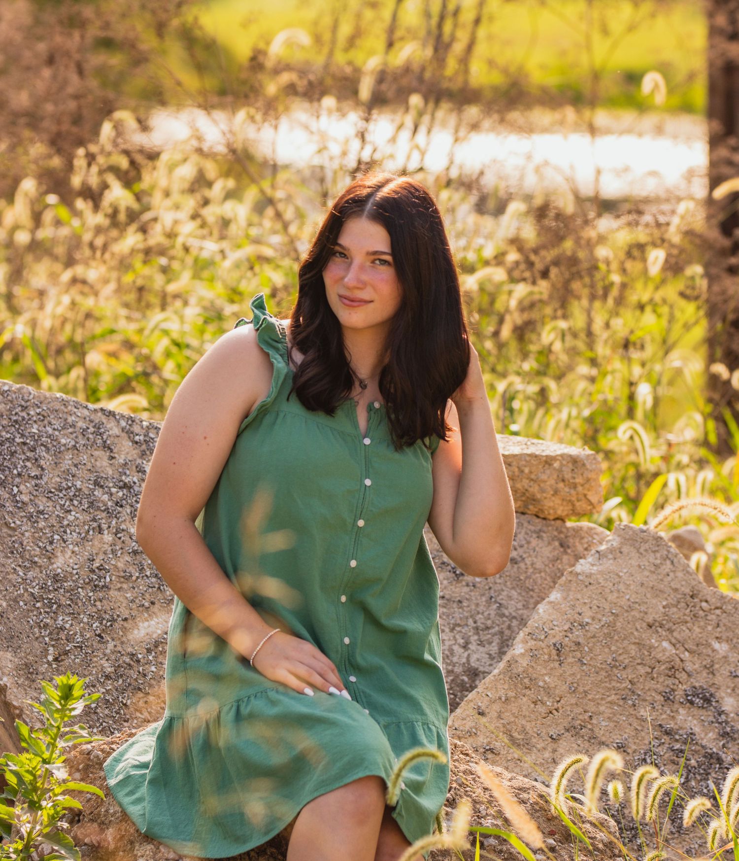Series of outdoor portraits in a green sleeveless top against a natural sunlit background.