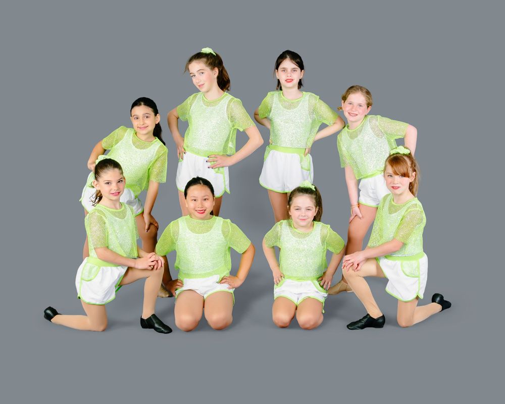 Sequence of people in white and neon green athletic wear performing stretching exercises on a gray background.