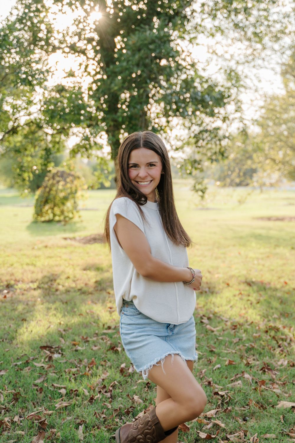 Bright and airy senior photo at golden hour