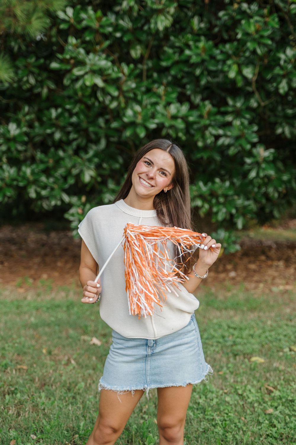 Senior portrait highlighting new college of choice
