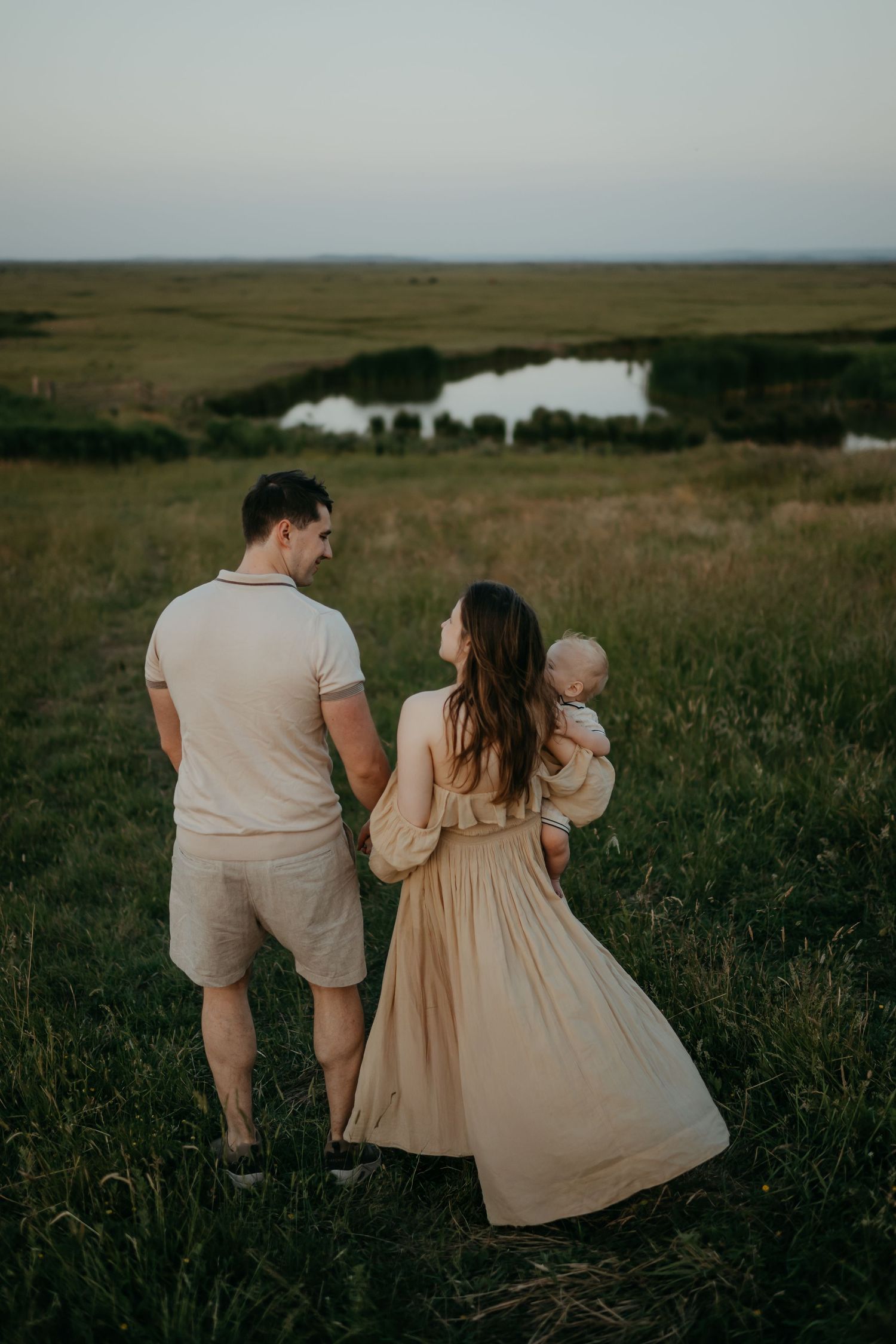 Family at sunset in Elmley Reserve during a photo session, Kent
