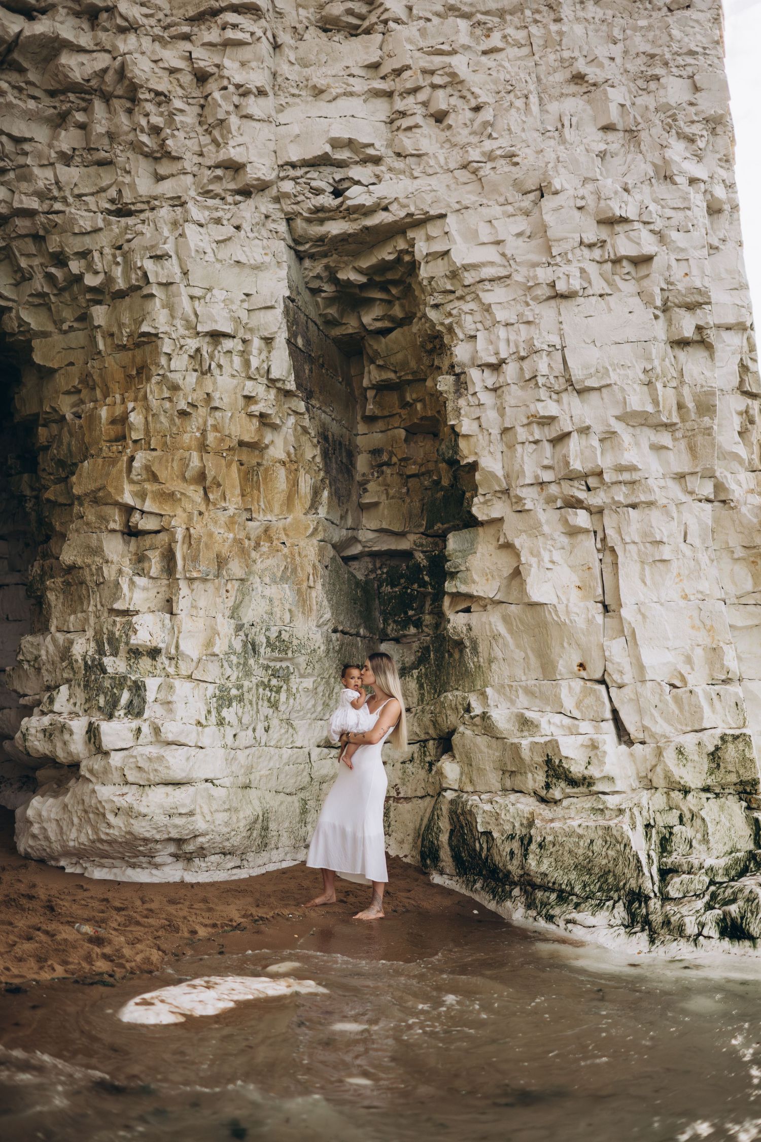 a mother and her baby girl posing at sunset in Botany Bay, Kent family photographer