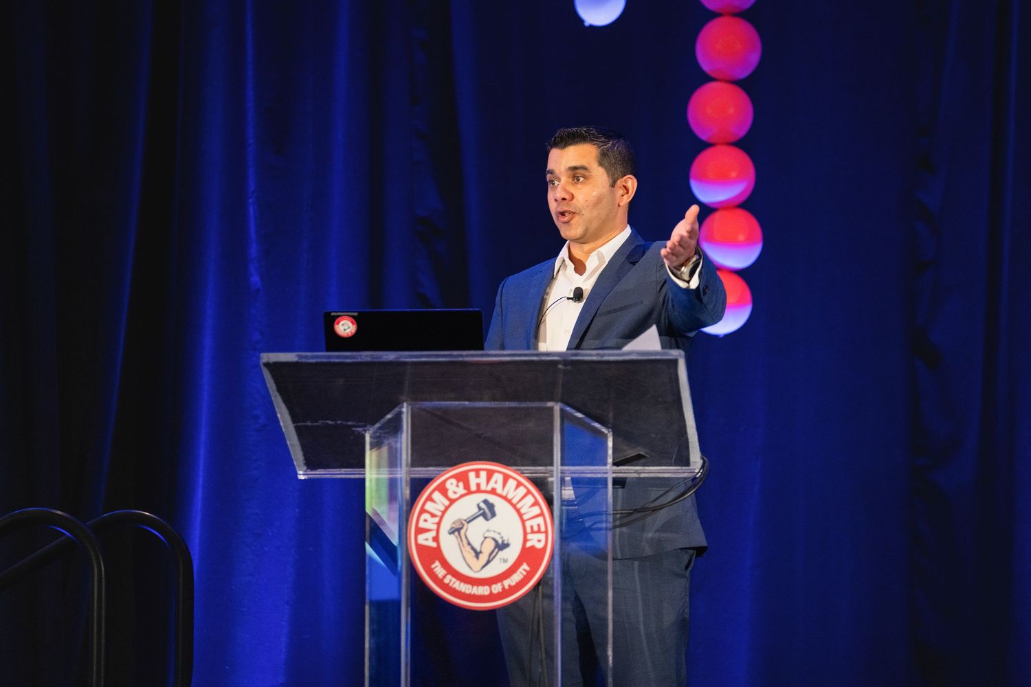 Orlando corporate event photographer Ray Alvarez — keynote speaker coverage at Arm and Hammer corporate conference