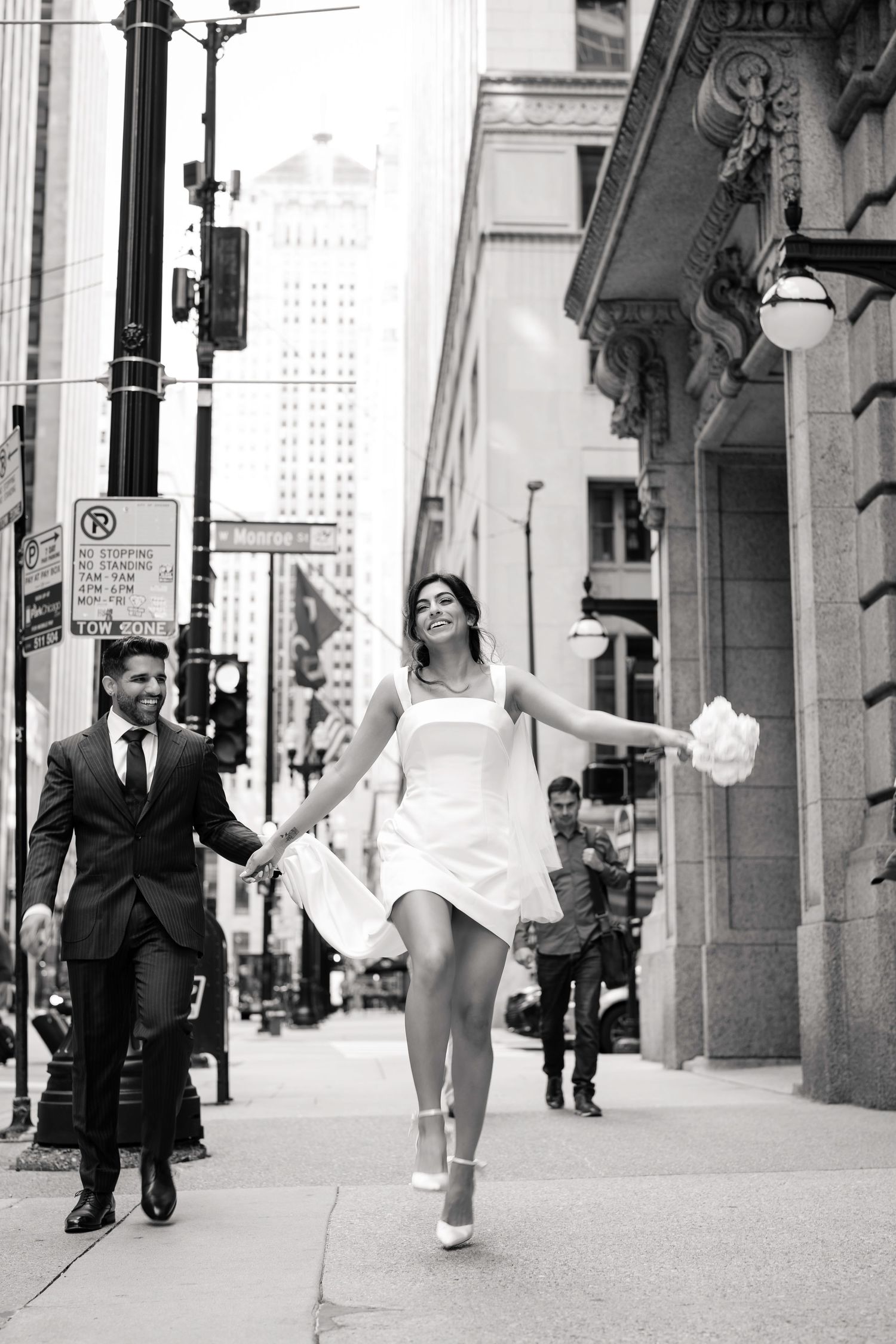 Black and white street photography series showing urban life with people walking on a city sidewalk.