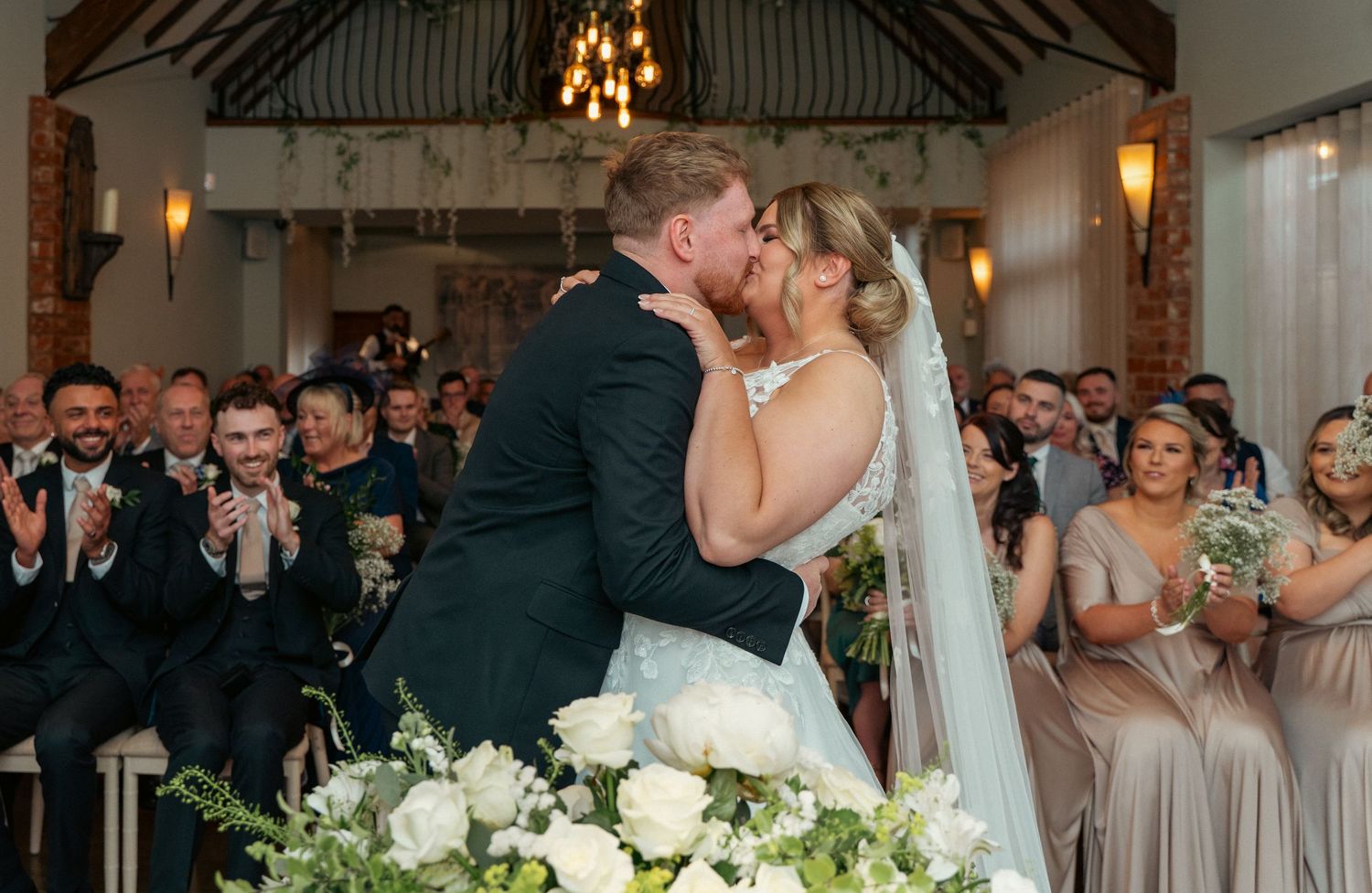 a bride and groom from coventry having couples portrait at Cheylesmore Manor House
