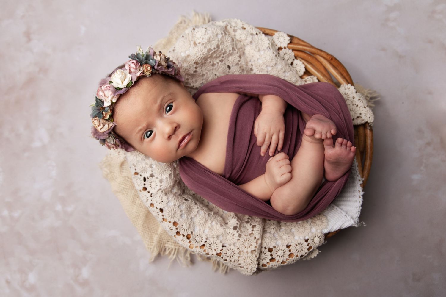 Newborn posing by kara jade photography