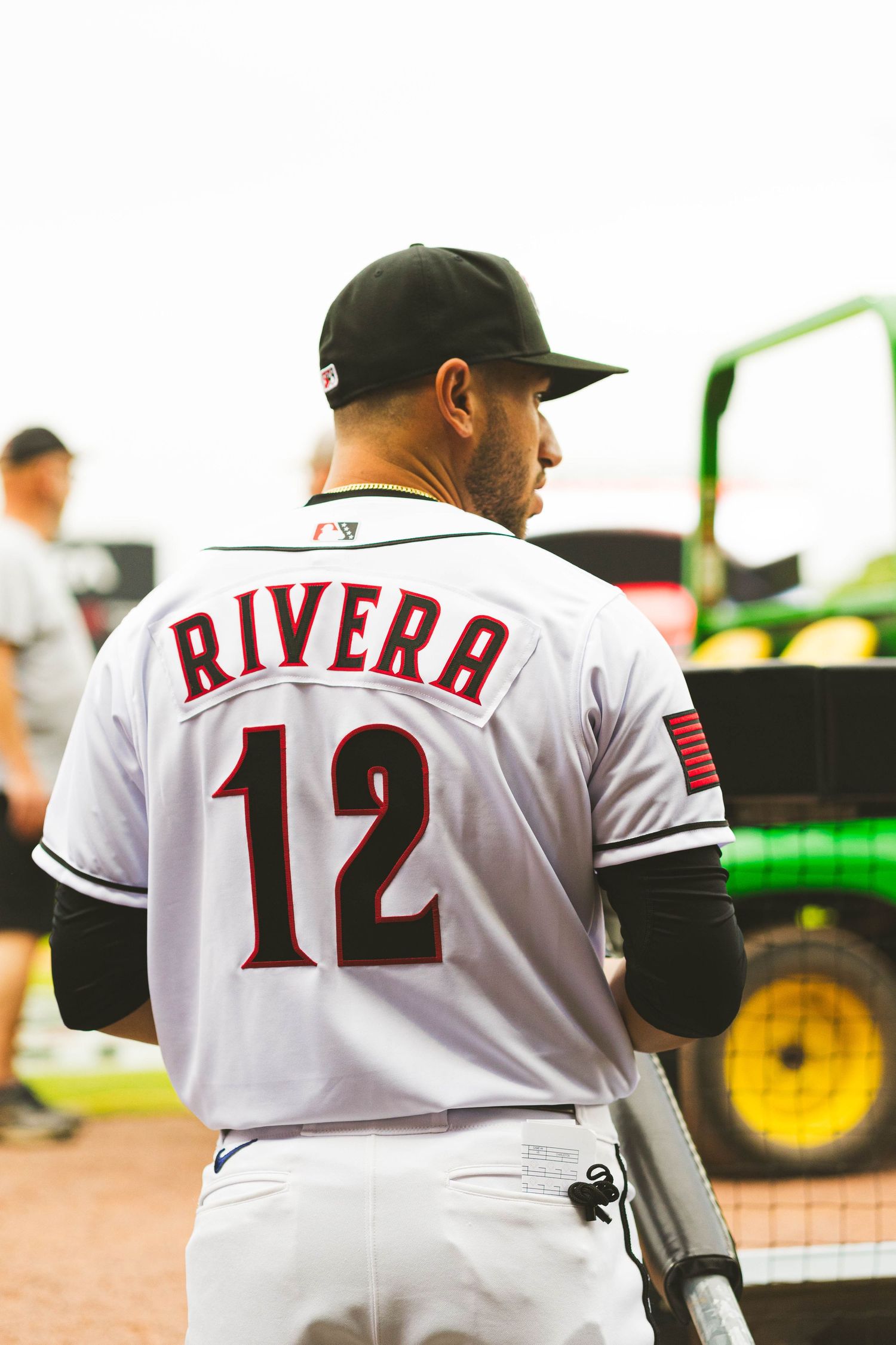 Baseball player wearing jersey number 12 with Rivera on the back.
