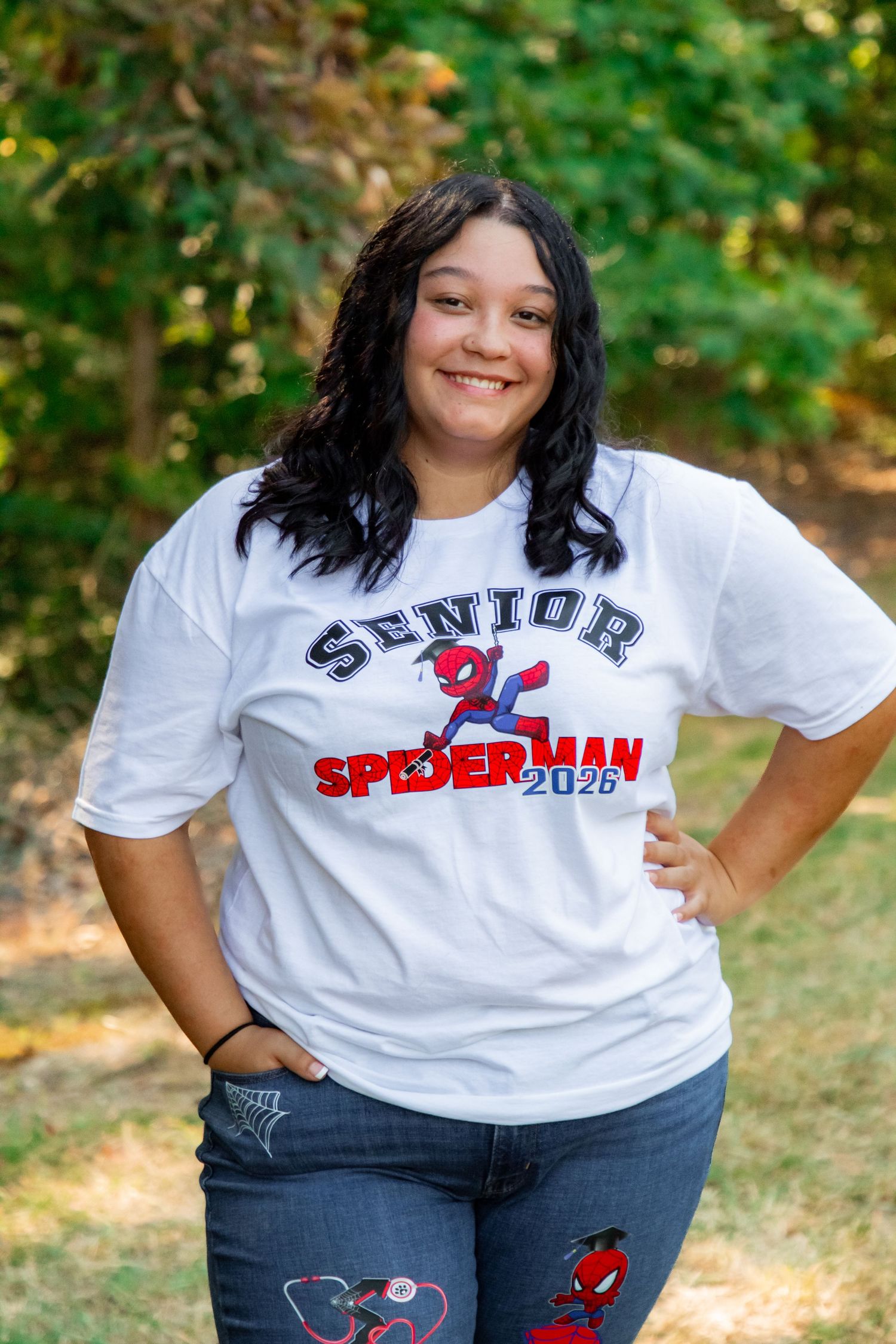 Color photo series showing a person in a Spider-Man themed senior class t-shirt posing against a green outdoor background.