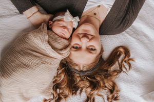 Intimate portrait composition with soft lighting and neutral tones.