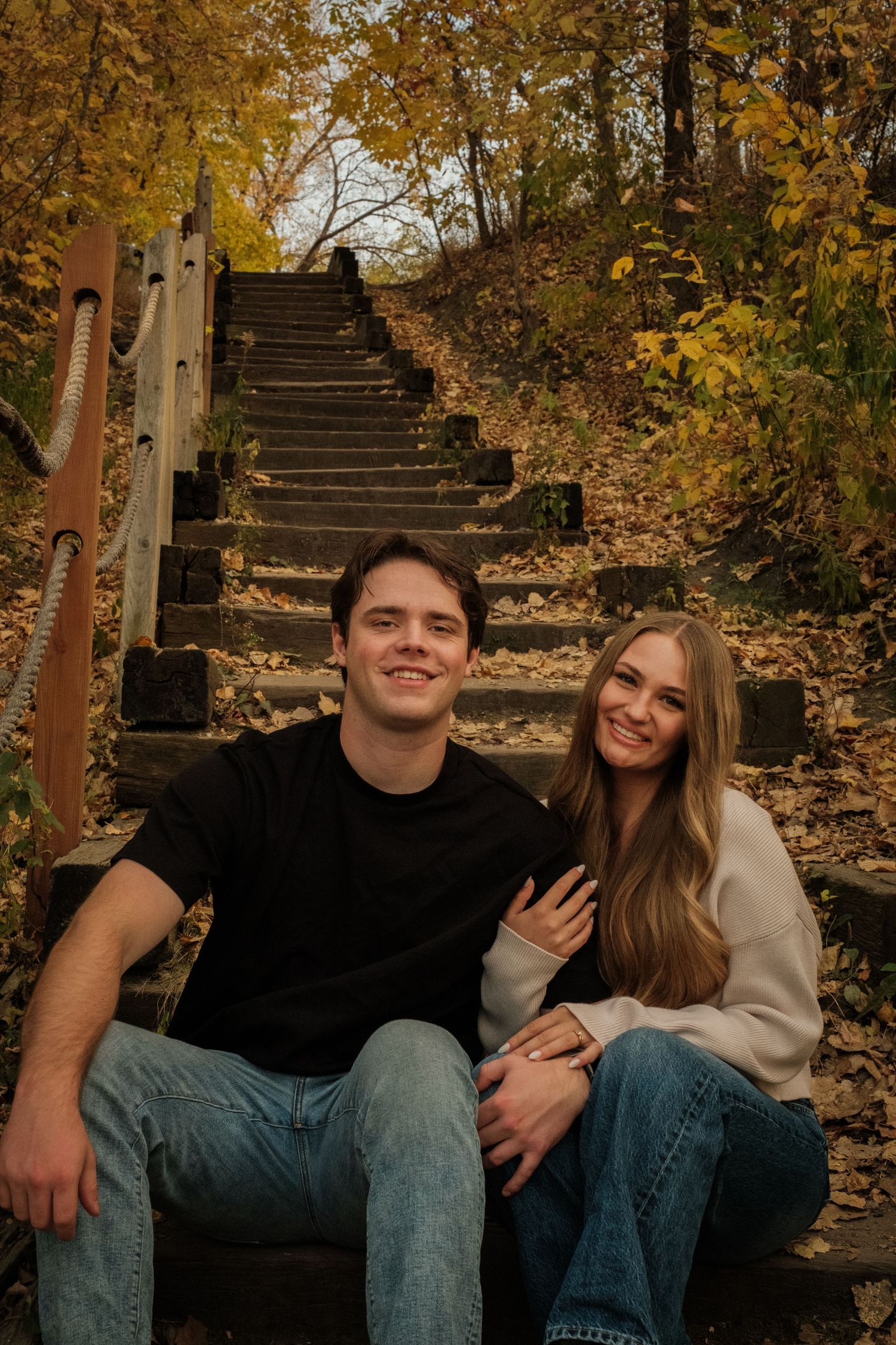 A couple's engagement session in Minneapolis on some stairs