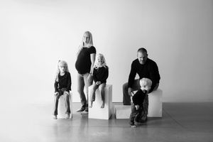 A black and white photo sequence shows figures in various crouching positions against a minimalist white background.