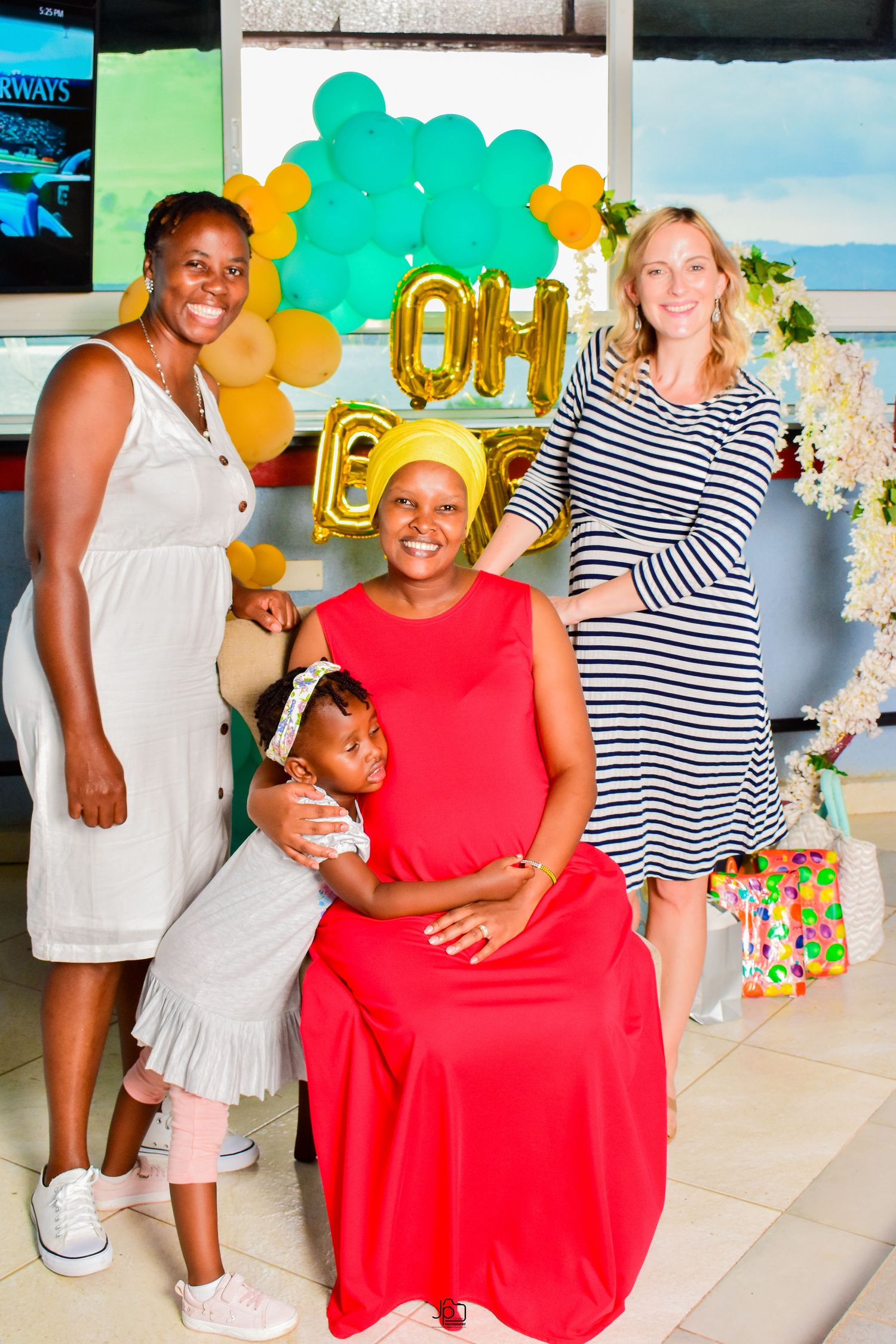 Group pose during a baby shower function