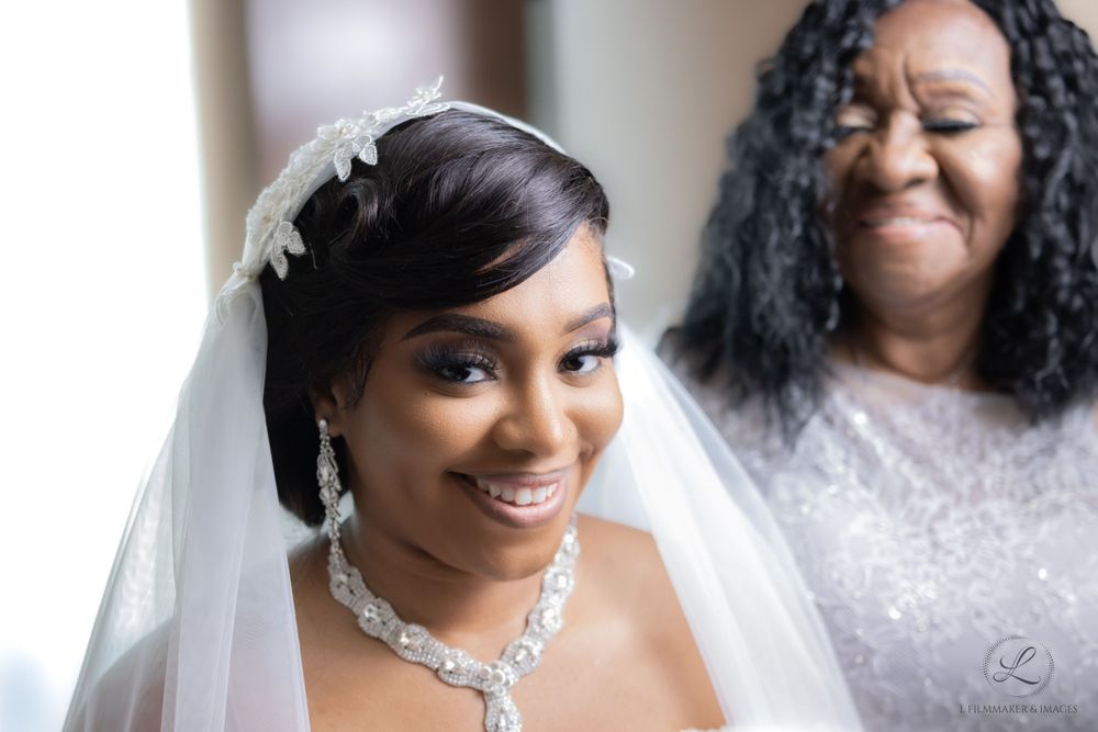 Beautiful bridal portrait with elegant veil and crystal necklace.