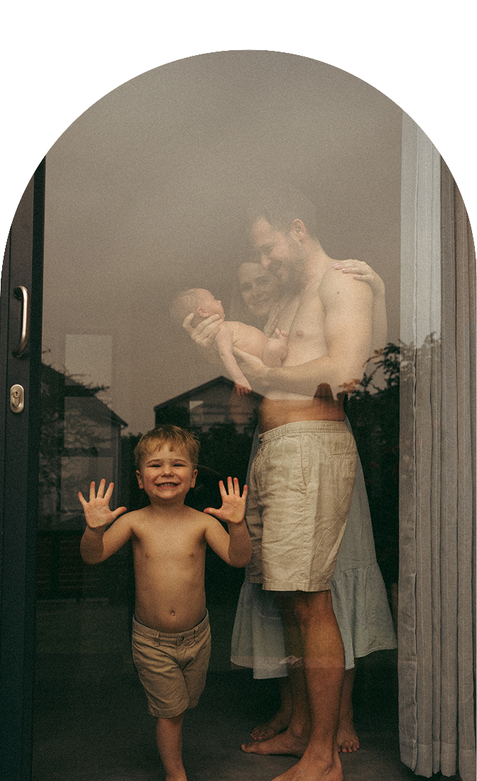 Series of candid family moments captured through a window with natural lighting.
