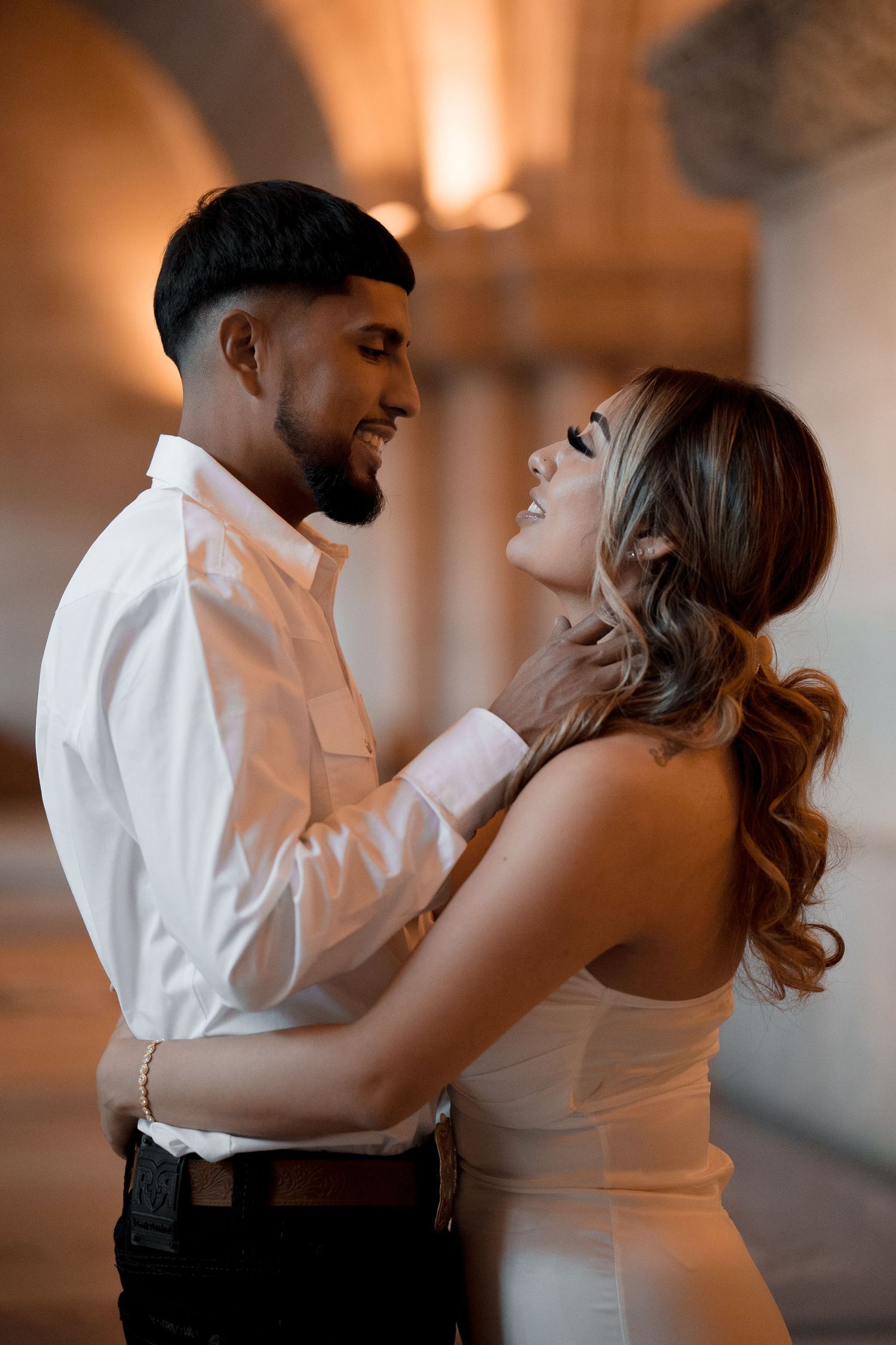 A romantic sequence of dance poses between a couple in formal attire against a warmly lit interior backdrop.