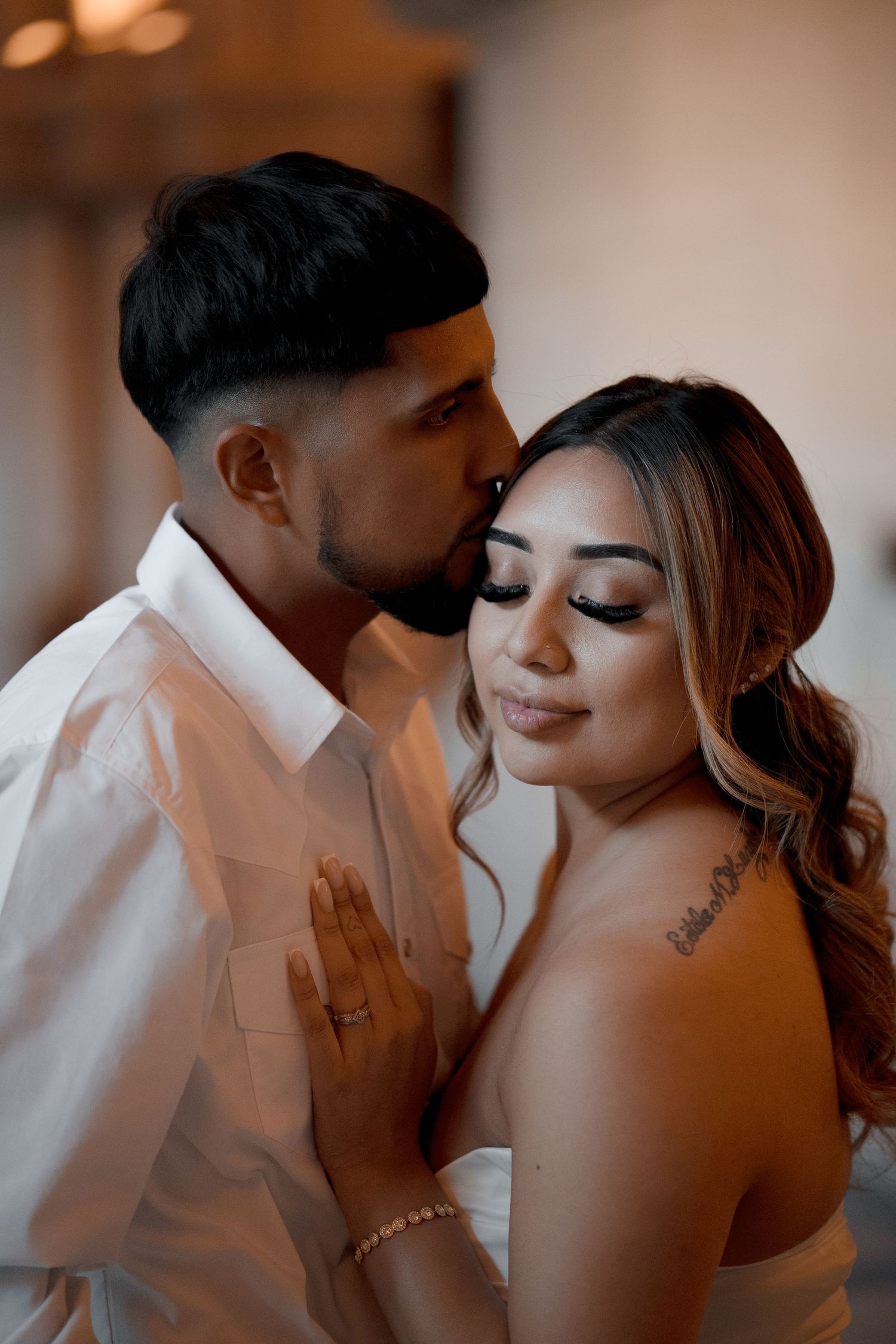 Romantic wedding photography sequence showing intimate close-up moments between a couple in warm lighting.