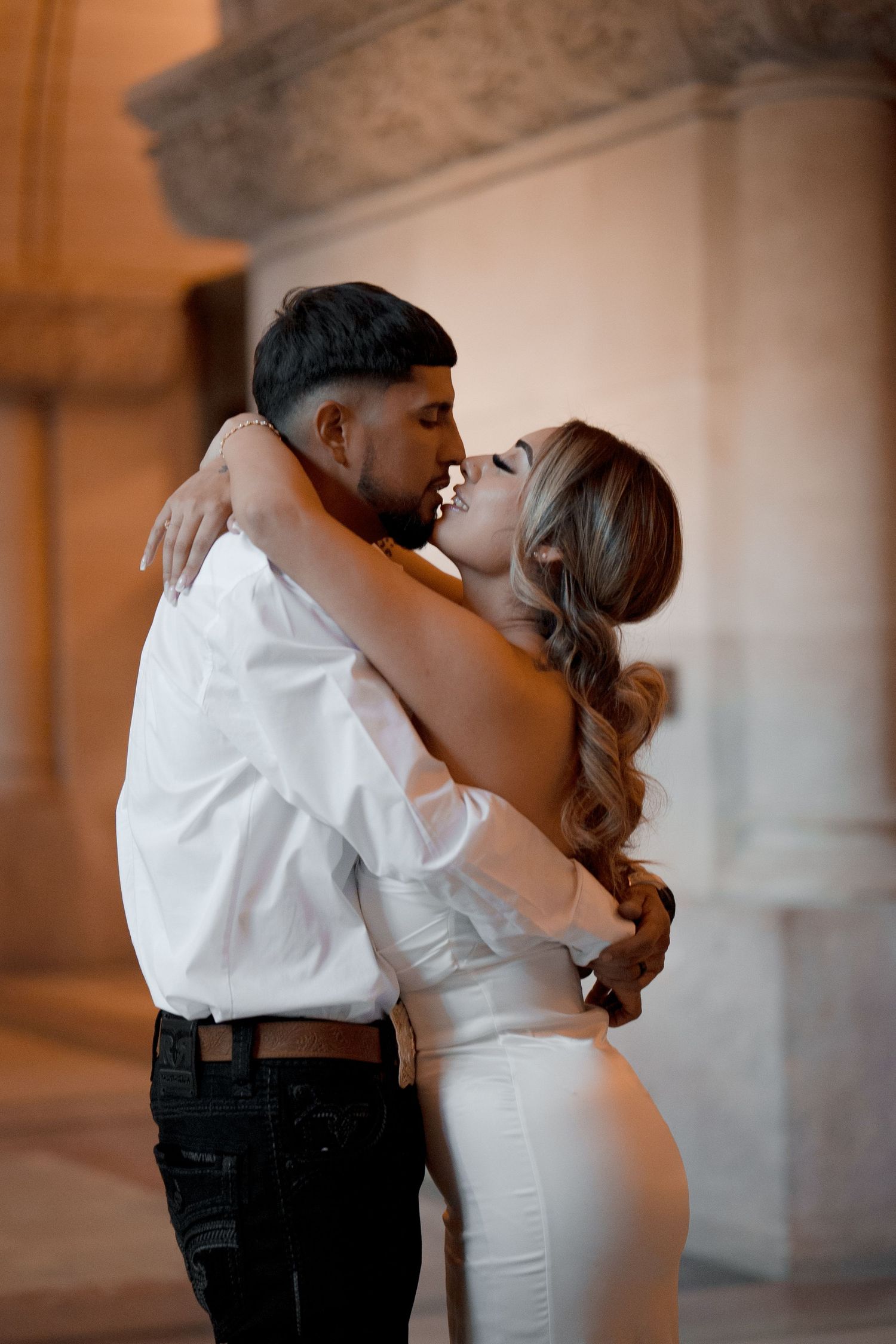 An intimate wedding photography sequence capturing tender moments between newlyweds.