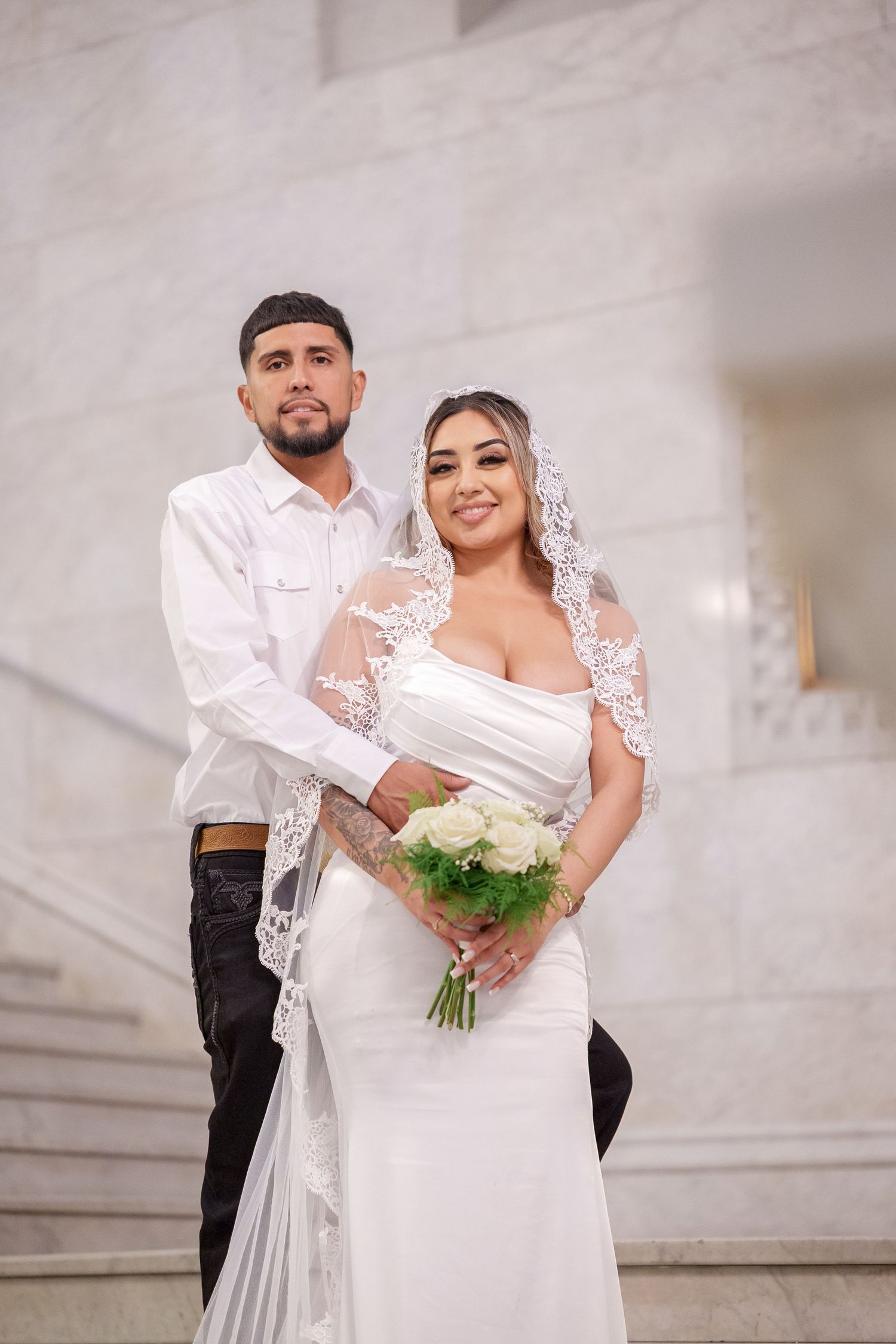 A series of wedding photos showing a couple in white attire posing on marble steps with a bridal bouquet.