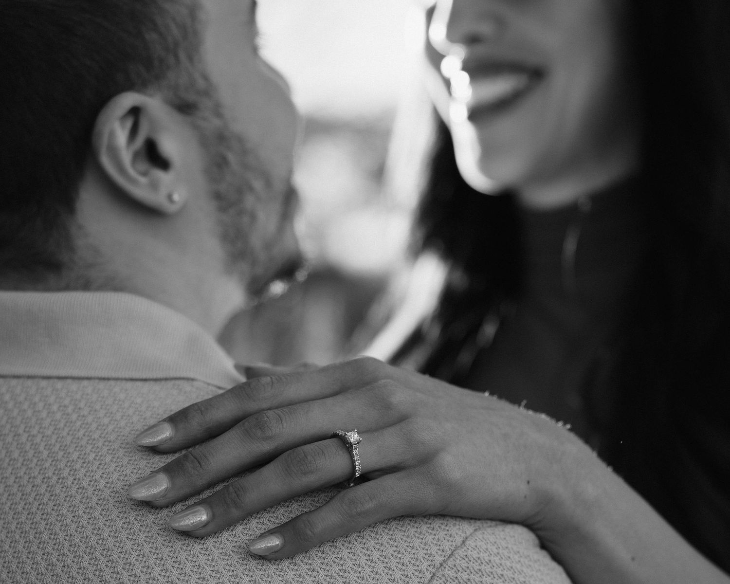 San Antonio Engagement Photography. Close-up of hands with engagement ring in intimate black and white portrait.