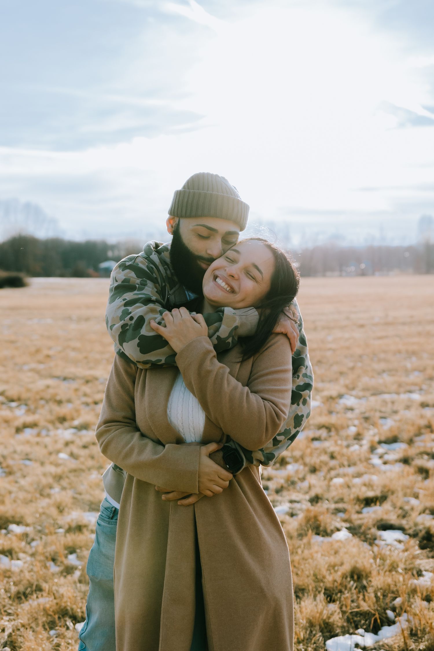 Cozy autumn outdoor embrace against golden field landscape.