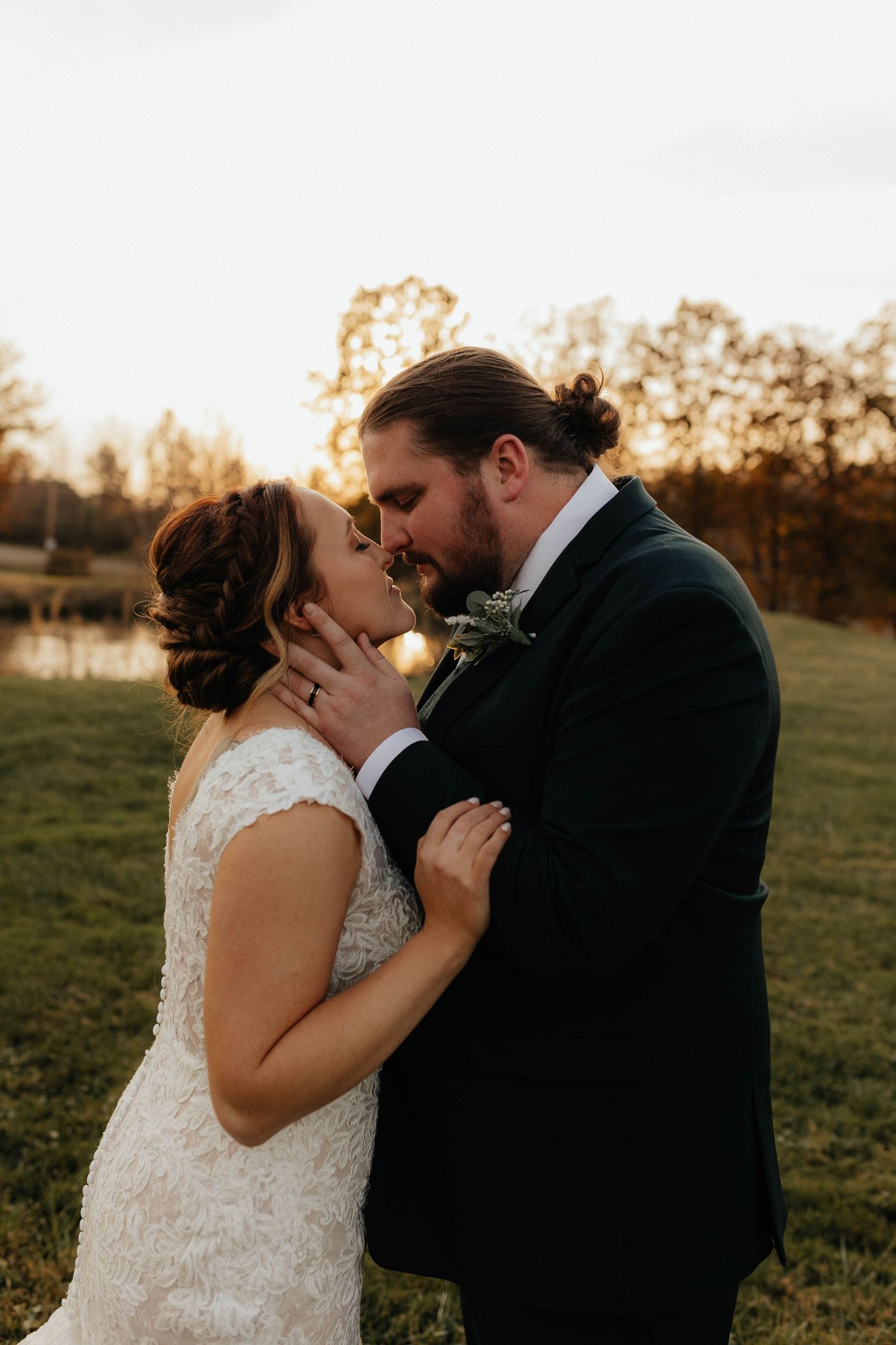 An intimate sunset wedding portrait captured during golden hour.