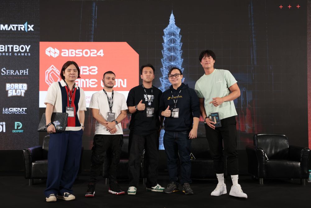 Five Web3 gaming professionals pose together at ABS024 Web3 Game Con conference stage.
