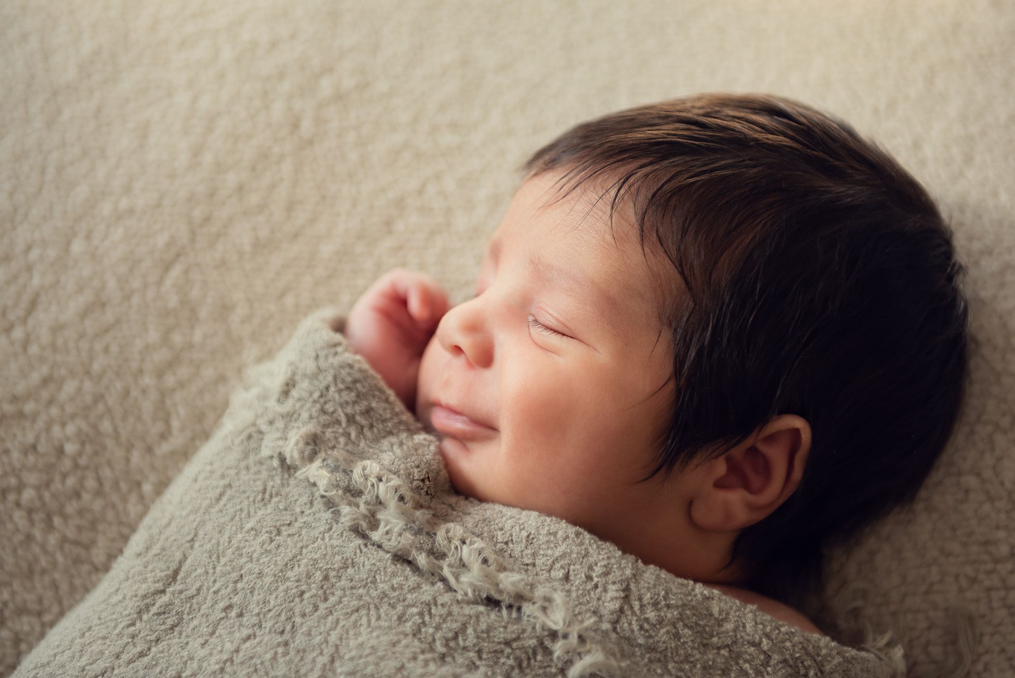 portrait of a newborn baby using window light during the photoshoot at home in Kleinburg, Ontario