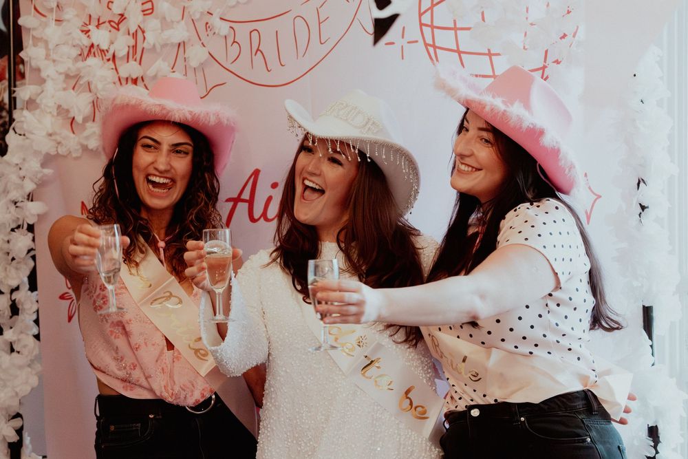A professional photograph at a hen do celebrating a wedding engagement