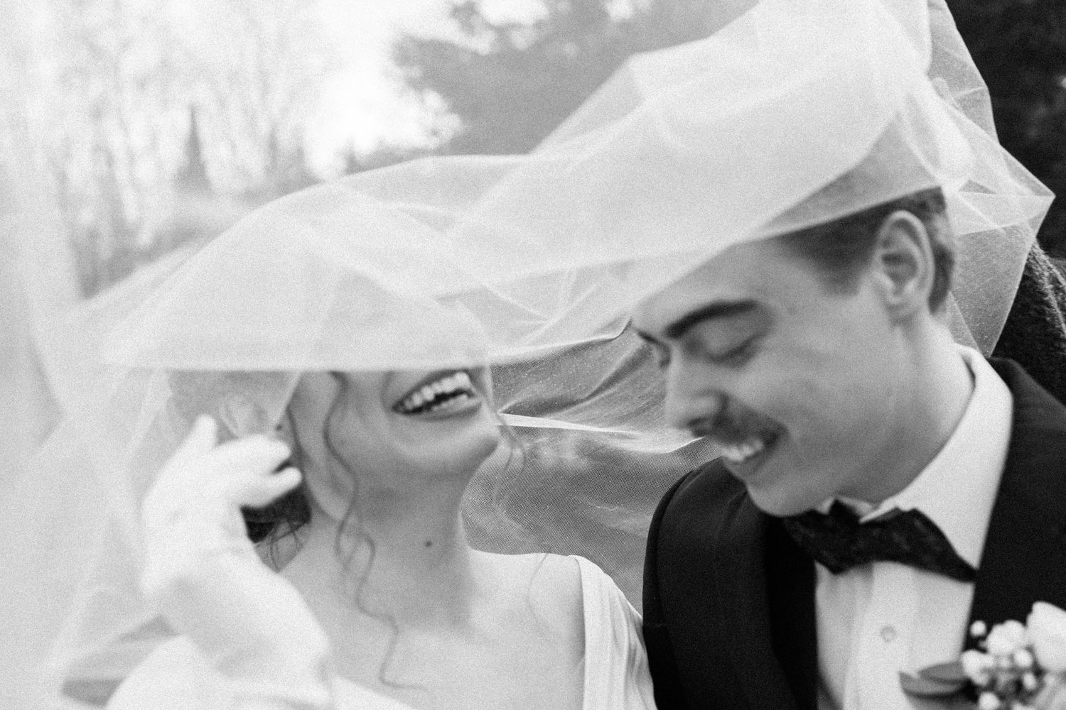 Wedding couple under veil