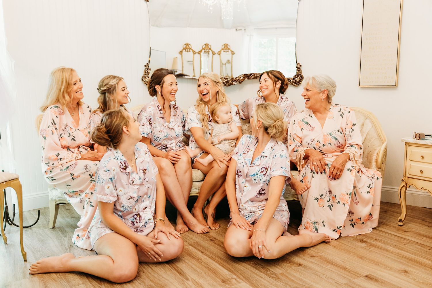 Georgia bridal party laughing at their inside jokes before getting into their dresses.