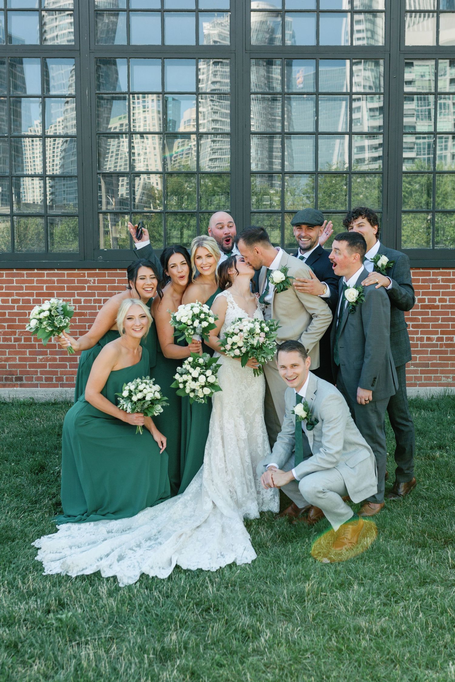 A candid moment of bridal party captured at Steam Whistle Brewery. Taken by Toronto wedding photographer, Katie Crane..