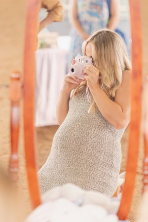 Child in a sparkly dress at a festive party celebration.