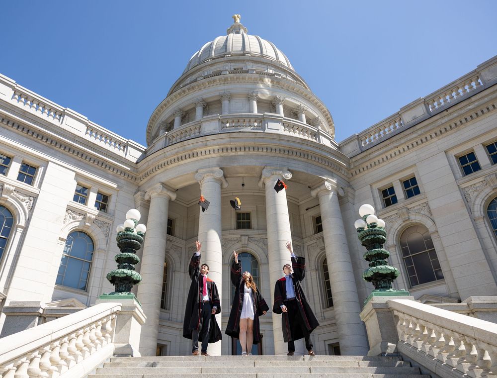 Panoramic view of the Wisconsin State Capitol building dome and exterior architecture in Madison.