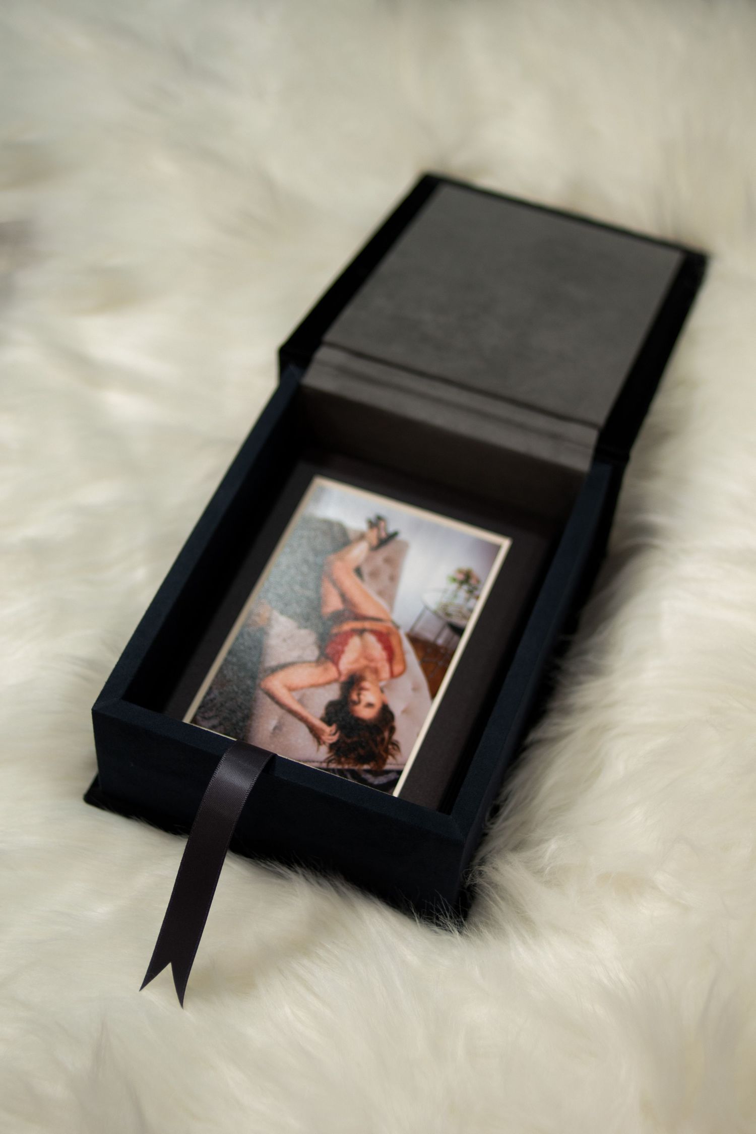 Luxury folio box with matted prints — handcrafted boudoir artwork made to last long after the session ends.