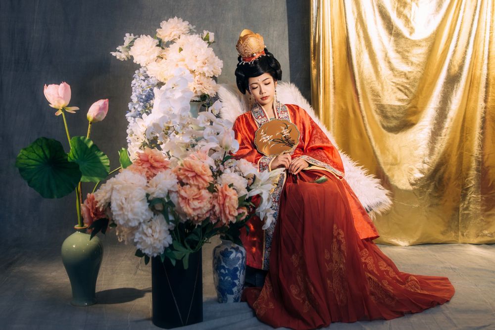 Formal Hanfu studio portrait capturing intricate details of traditional Chinese wedding gowns, by Imagine Image Studio Auckland.