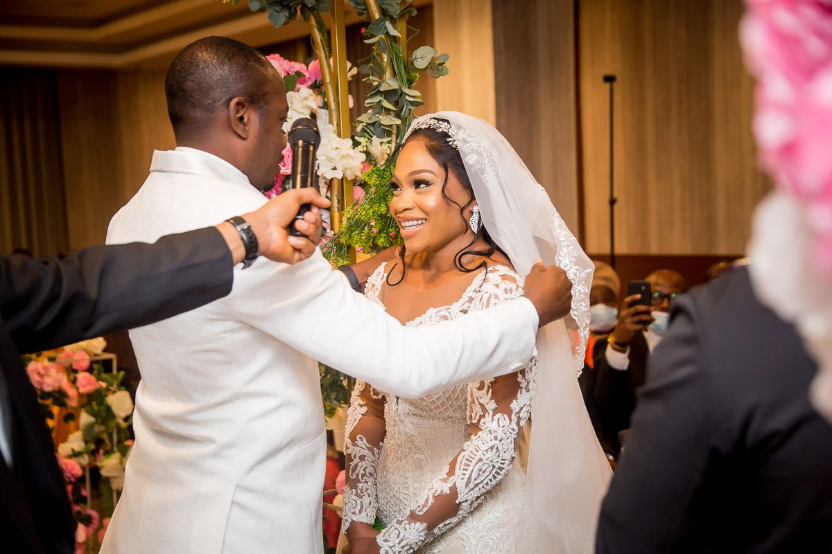 Tender moment, groom's reaction seeing bride, Toronto ceremony