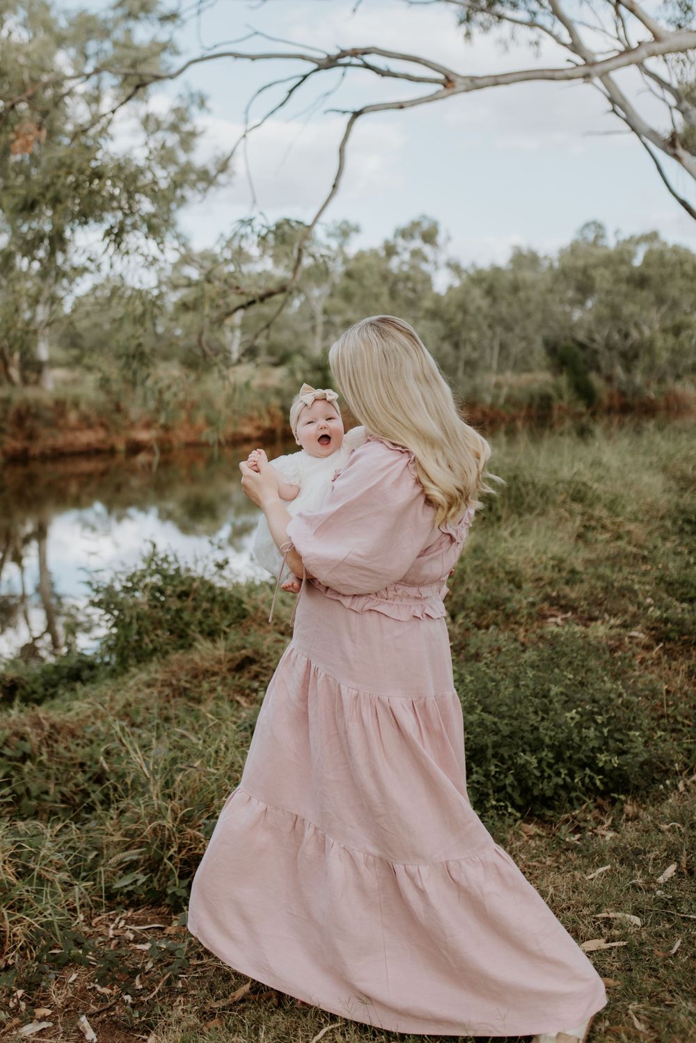 motherhood session by a river in mount isa, mother and daughter dance