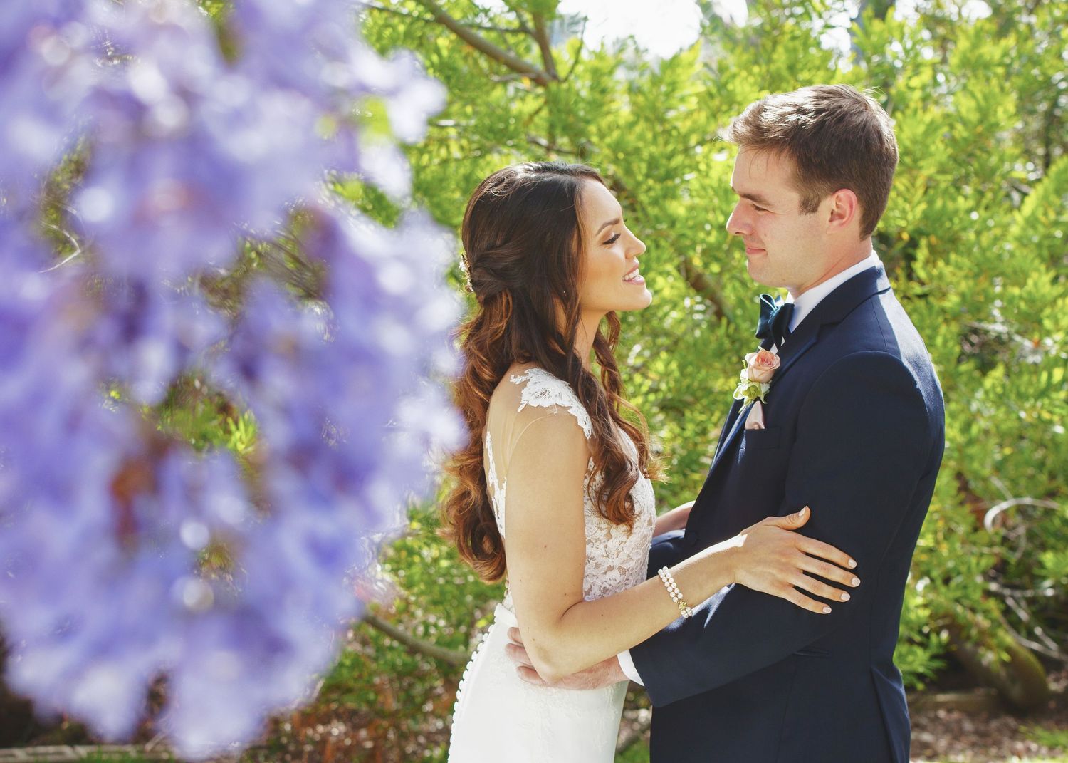 married couple under a tree at a wedding at rancho santa fe Inn in San Diego, CA