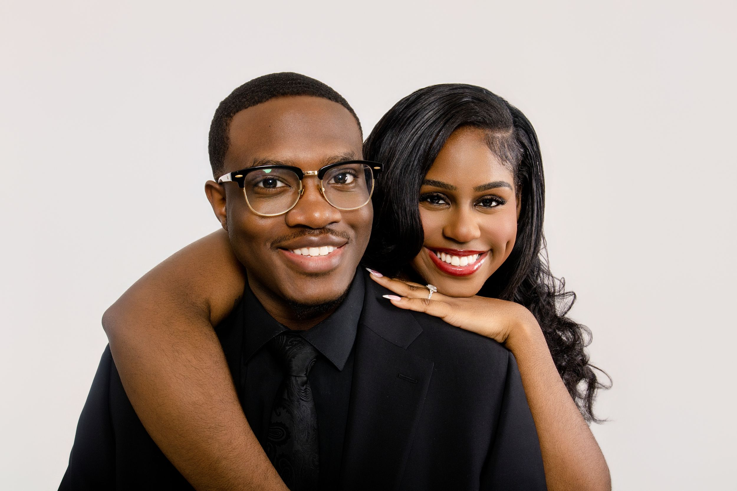 Elegant studio portrait session against a white background.