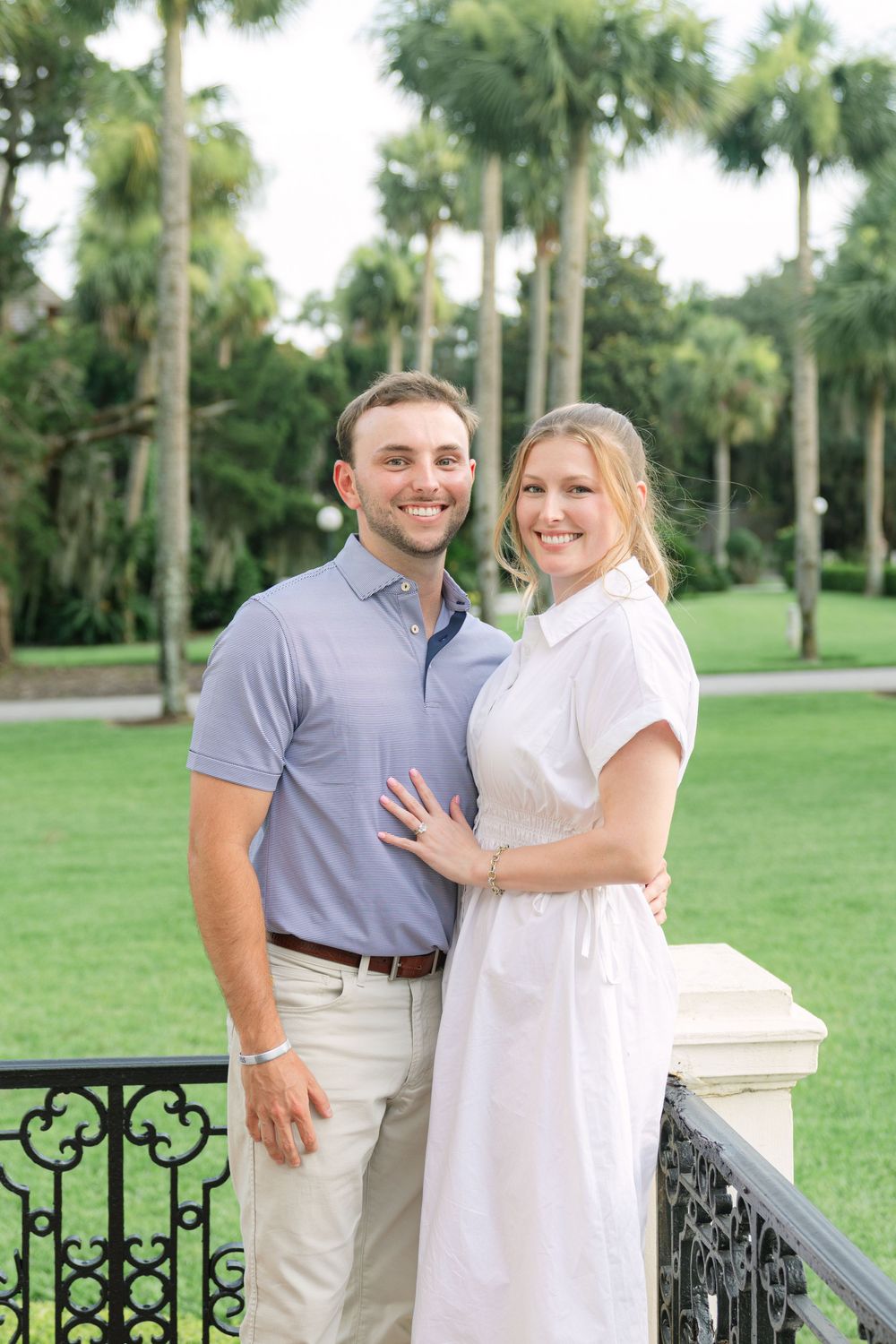 Jekyll Island proposal near Cherokee Cottage with deer in background—historic engagement photography in Georgia’s Golden Isles.