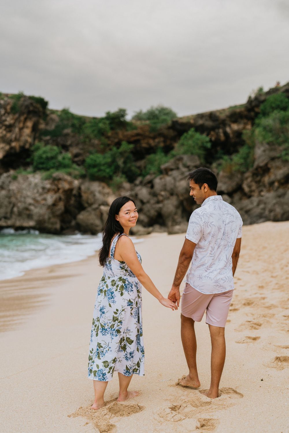 Romantic beach portrait session for couples at Balangan Beach in Bali.