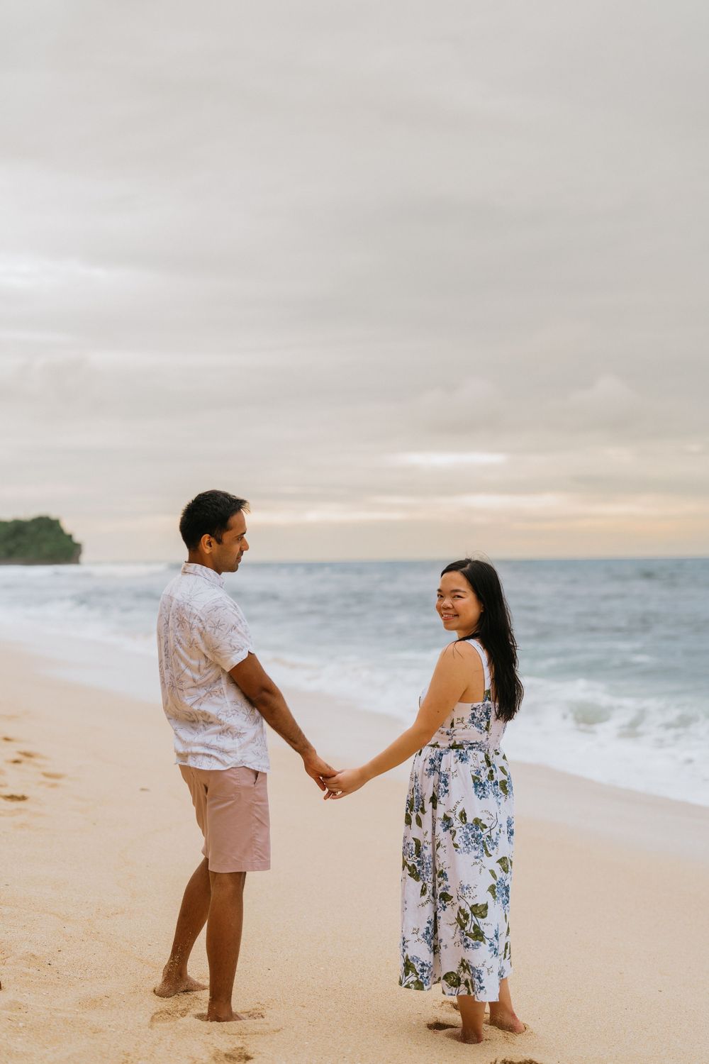 Romantic beach portrait session for couples at Balangan Beach in Bali.