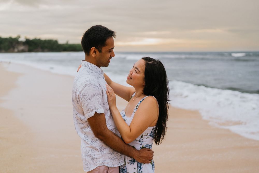 Romantic beach portrait session for couples at Balangan Beach in Bali.