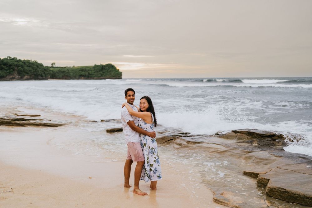 Romantic beach portrait session for couples at Balangan Beach in Bali.