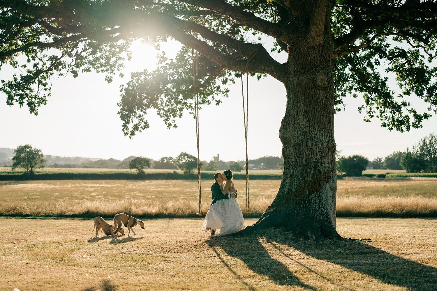 Editorial summer wedding photography style by Alicia Victoria, showcasing couple in warm light
