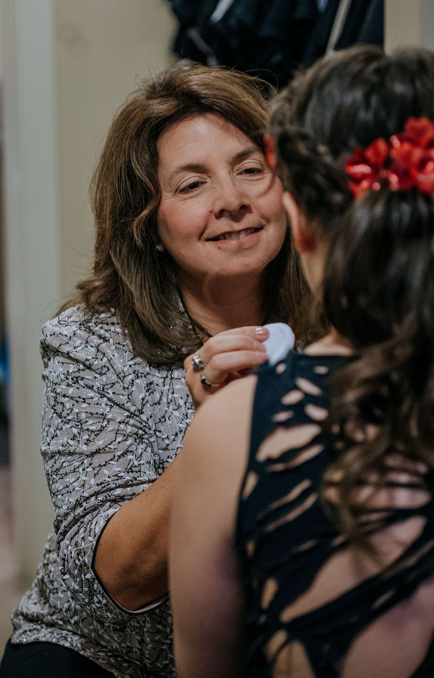 Two people share an intimate moment in a series of candid photos showing genuine emotion and connection.