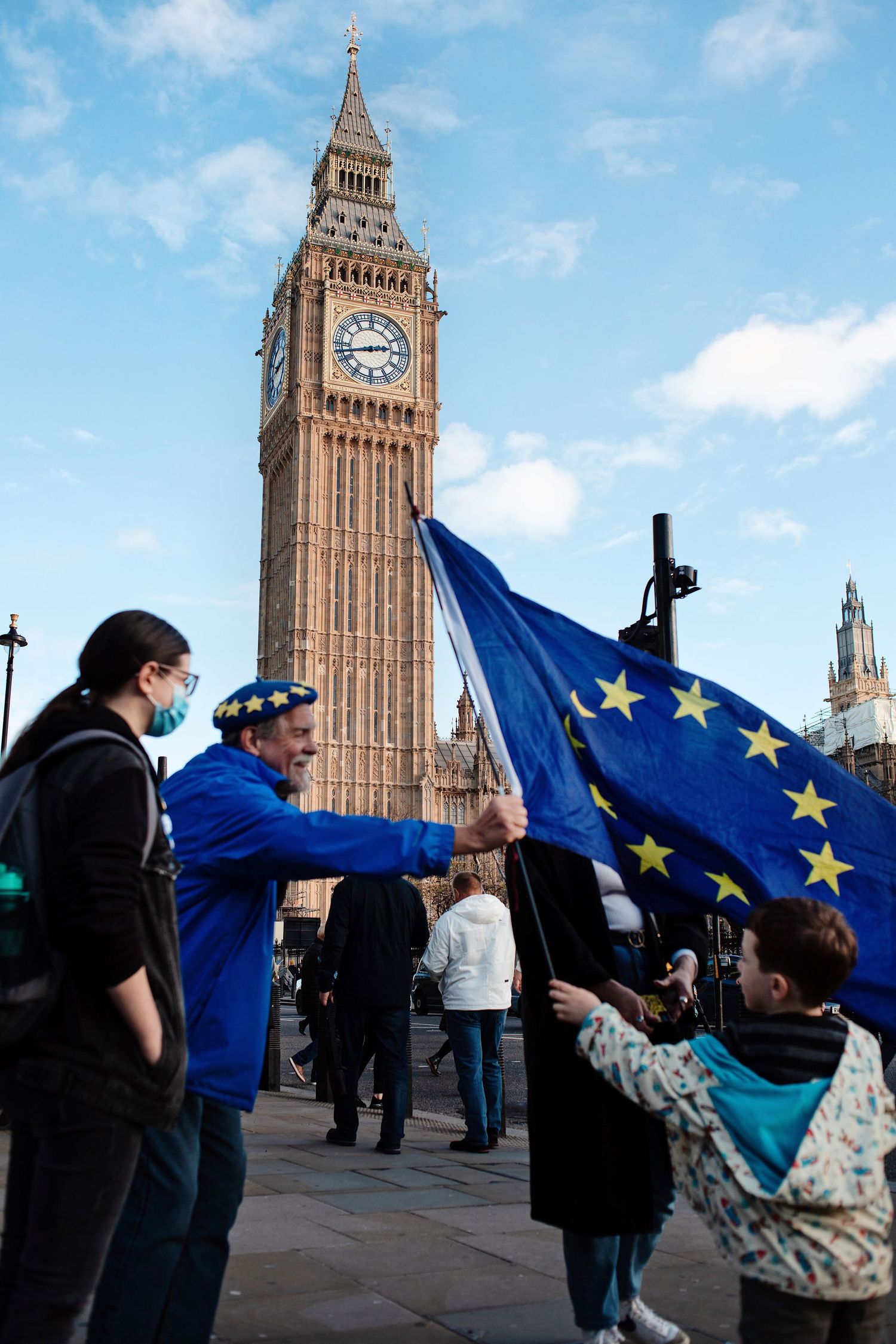 Protesters wave European Union flags in front of Big Ben and the Houses of Parliament in London during a demonstration.